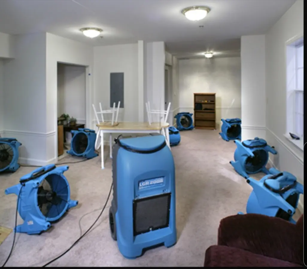 Air movers and dehumidifier setup for Water Extraction & Removal in Leeds